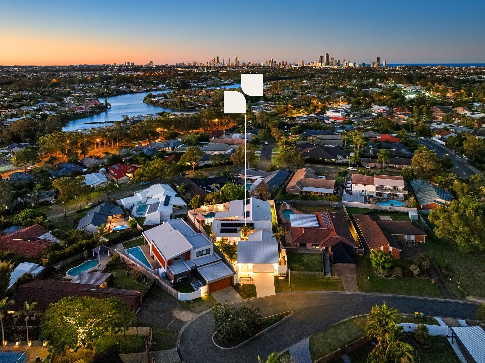 Evening Context. Front garden of a Gold Coast residence by SunnyDay Development.