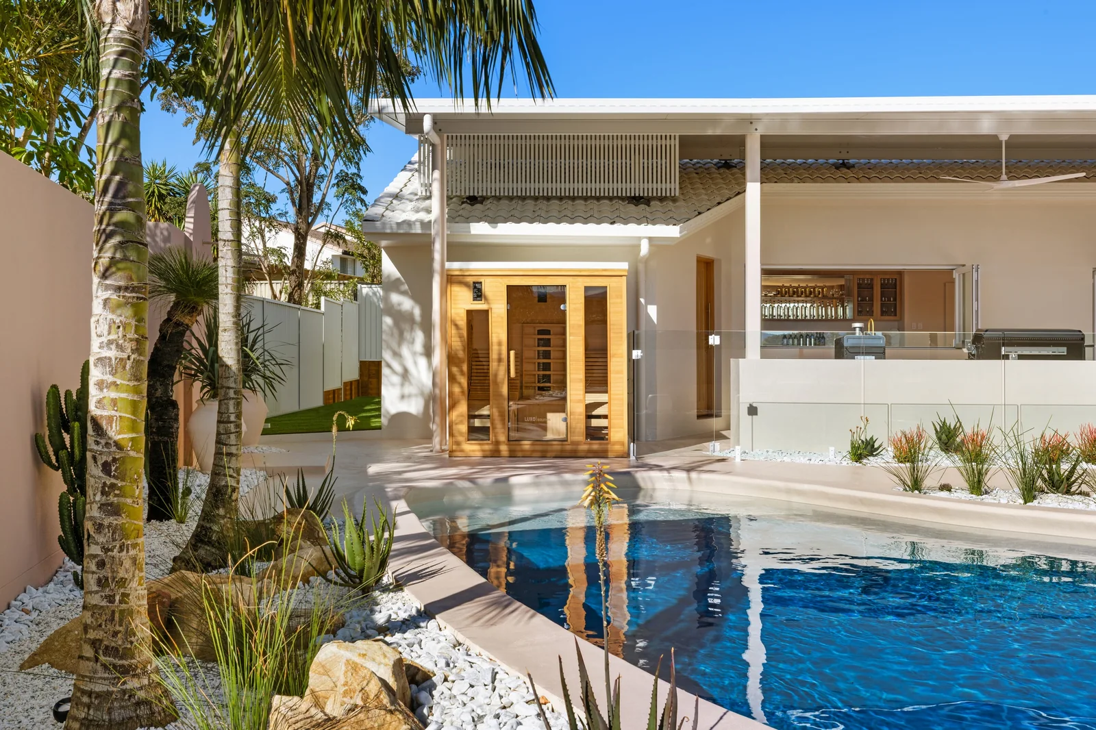 Courtyard Reflection. Back garden of a Gold Coast residence by SunnyDay Development.