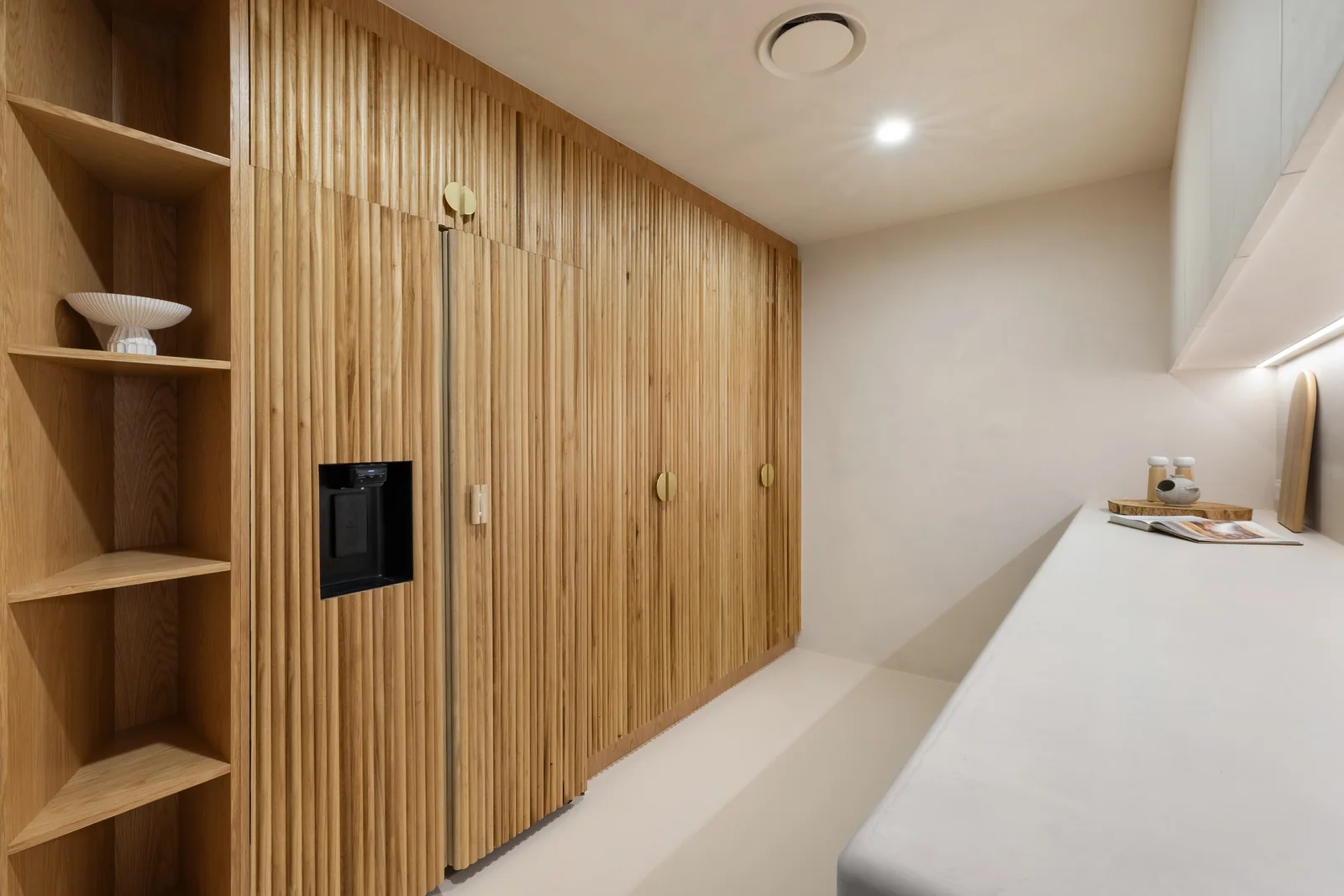 Concealed Joinery. King bedroom of a Gold Coast residence by SunnyDay Development.